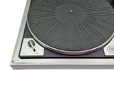 a turntable that is sitting on top of a table
