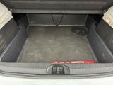 a trunk of a car that has a seat in it