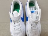 white and blue nike air force sneakers with green soles
