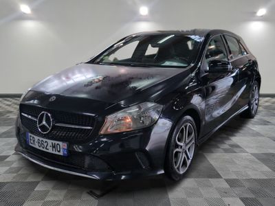 la mercedes cla est garée dans un garage dont le sol est recouvert de carreaux