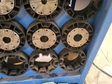 a picture of a blue box with a bunch of wheels in it