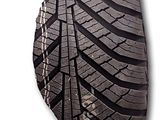 a close up of a tire on a white background