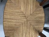 an image of a chair made out of wood and wicker