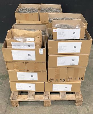 several cardboard boxes stacked on top of each other on a pallet