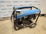 a blue and black generator sitting on top of a cart