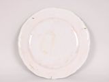 a white plate that has a number on it