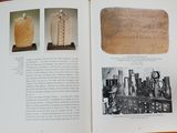 a book open to a page with pictures of vases on it