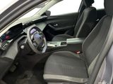 the interior of a car with a steering wheel and a dashboard