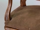 an image of a chair with a brown seat and a brown cushion