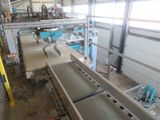 an image of a factory with a conveyor belt