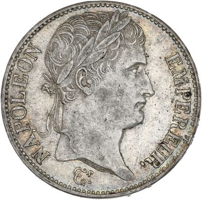 gros plan d'une pièce de monnaie sur laquelle figure une tête de femme