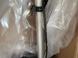 a metal pole that is sitting in a box
