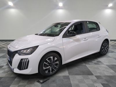 the white car is parked on a checkered tile floor