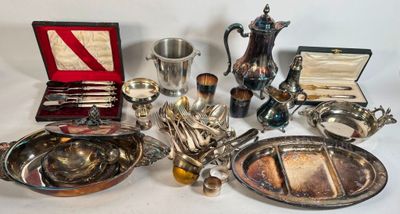 a lot of silver items that are on a table