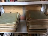 many books on the shelves in the room