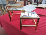 three tables with glass tops on a red table cloth