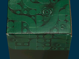 a green box with pink roses on it on a blue background