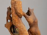 two bears that are playing with each other on a table