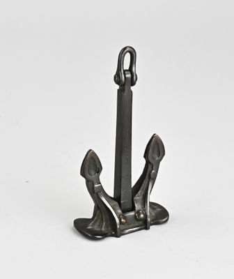 un ancrage métallique muni d'une paire de sabots