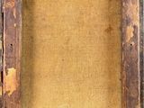 a close up of a painting of a wooden frame on a wall