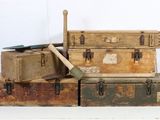 a pile of old suitcases stacked on top of each other
