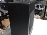 a black box sitting on top of a white table