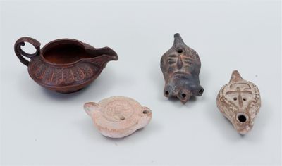 several different types of pottery items are displayed on a white surface