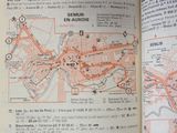 an open book with a map of a city