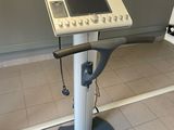 a machine that is sitting on a stand in a room