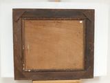 an old picture frame with a wooden easel on a white surface