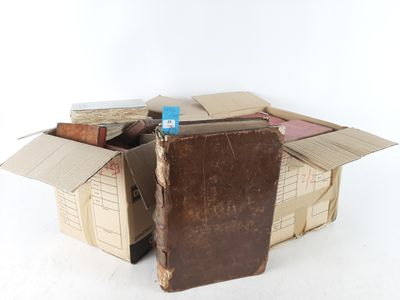 a cardboard box that has some books inside of it