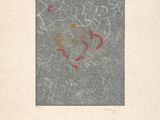 an old book with a drawing of a face on the cover