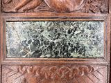 a wooden panel with a picture of a woman on it