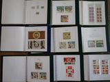 many different types of stamps on the pages of a book