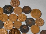 a lot of coins that are sitting on a table