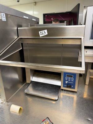 an image of a kitchen with a lot of equipment on the floor