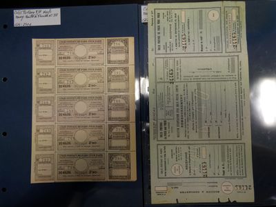 un dossier sur lequel sont posés de nombreux documents