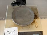 an image of a scale with a price tag on it