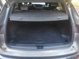 a trunk of a car with the back door open