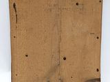 an image of a piece of wood with holes in it