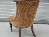 a chair that is sitting in front of a garage door
