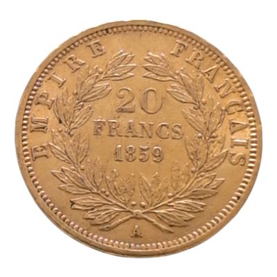 Gros plan sur une pièce d'or ornée d'une couronne.