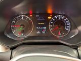 a close up of a car dashboard with various gauges