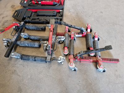 a lot of tools that are laying out on the floor