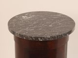 a marble top on a round table with a wooden base