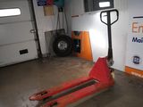 an image of a fork lift truck in a garage