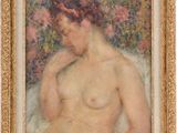 un tableau représentant une femme nue, dans un cadre doré