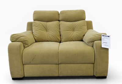 the reclining loveseat has two pillows on the back of it