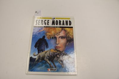 la couverture d'un livre sur laquelle figure l'image d'un homme et d'un chien