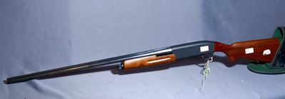 the rifle is laying on the table ready to be used